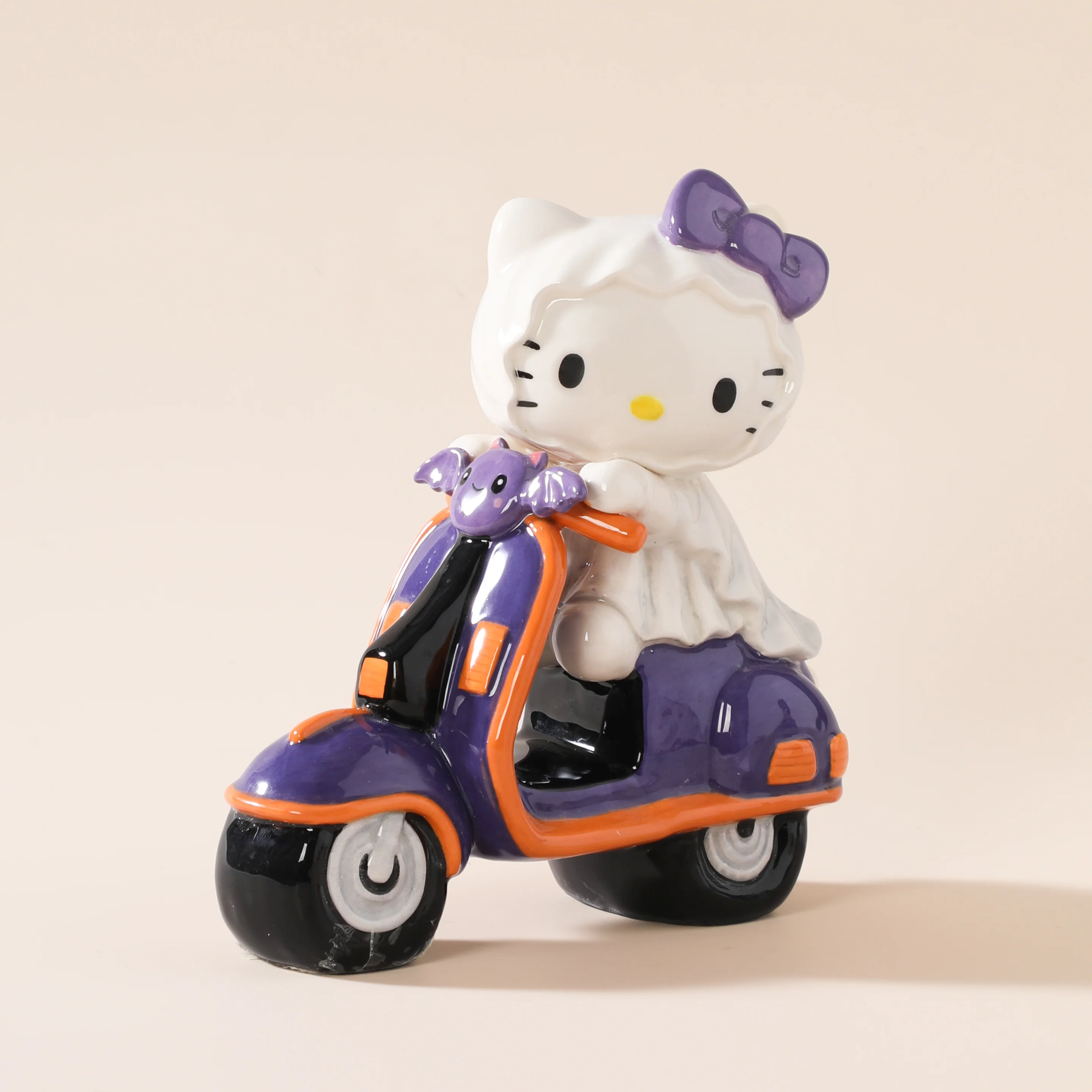 Hello Kitty Bat Scooter Figurine