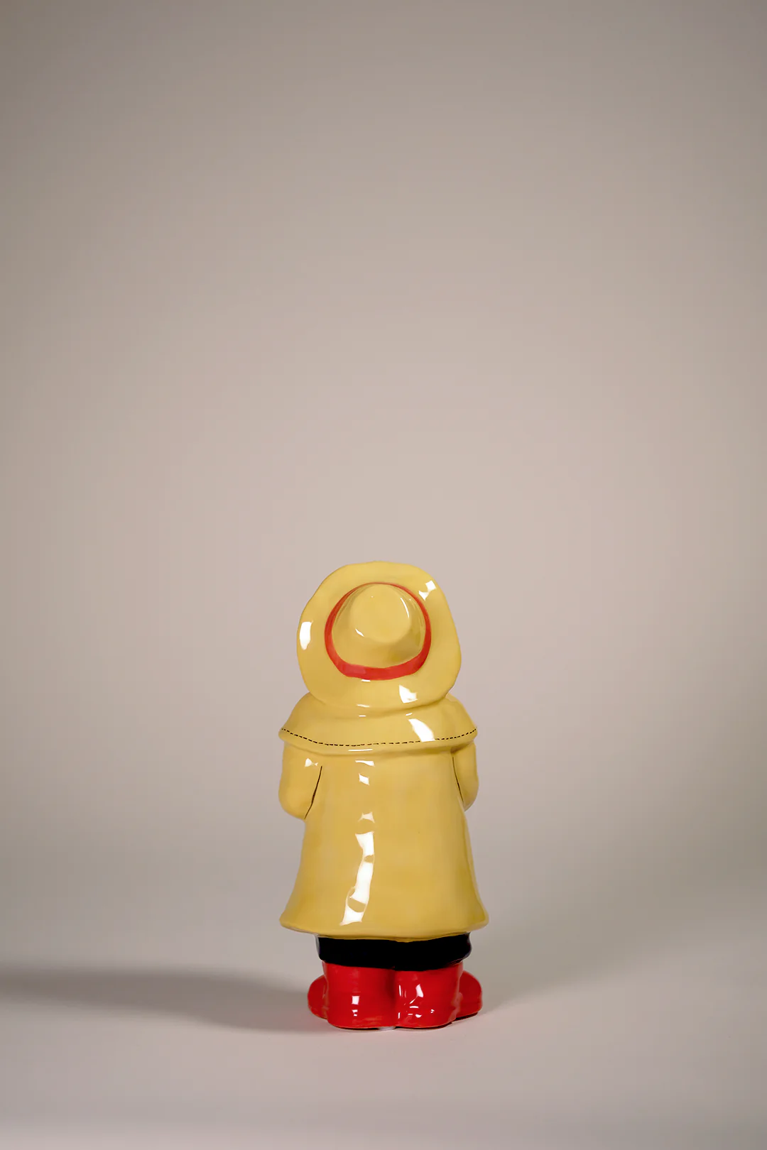 Man Holds the Sailboat Figurine - Image 4